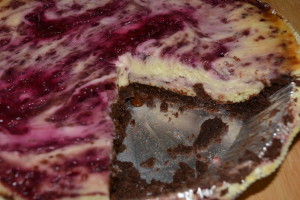 Wonderful blackberry puree swirled into a gluten free baked cheesecake on top of a chocolate cookie crust.