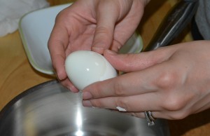 Peel shells gently from eggs.