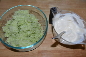 Mix cabbage and mayonnaise and sour cream mixture until thoroughly combined.