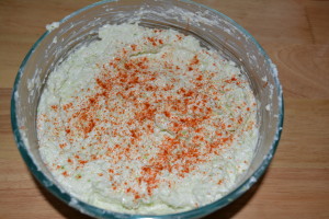 Taste mixed cabbage and salt to taste. Dust top with paprika to finish.