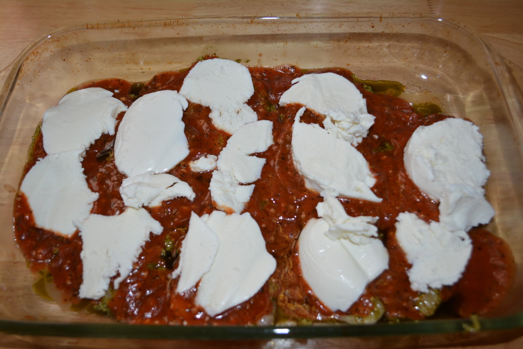 Add red sauce and fresh mozzarella on top of chicken and bake.