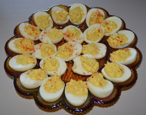 Deviled eggs dusted with paprika.