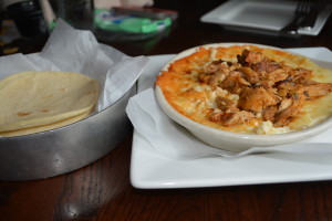 Gluten free Queso Fundido with chicken and corn tortillas at La Hacienda de San Angel in Epcot.