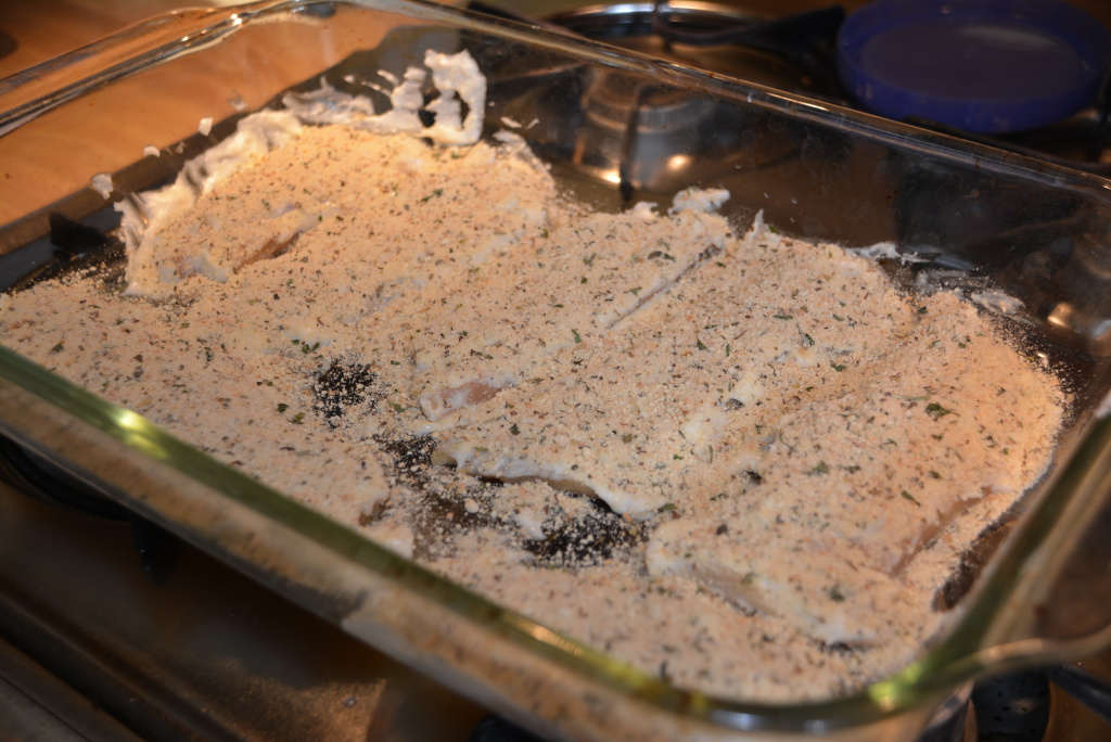 Sprinkle tops of chicken with seasoned gluten free bread crumbs.