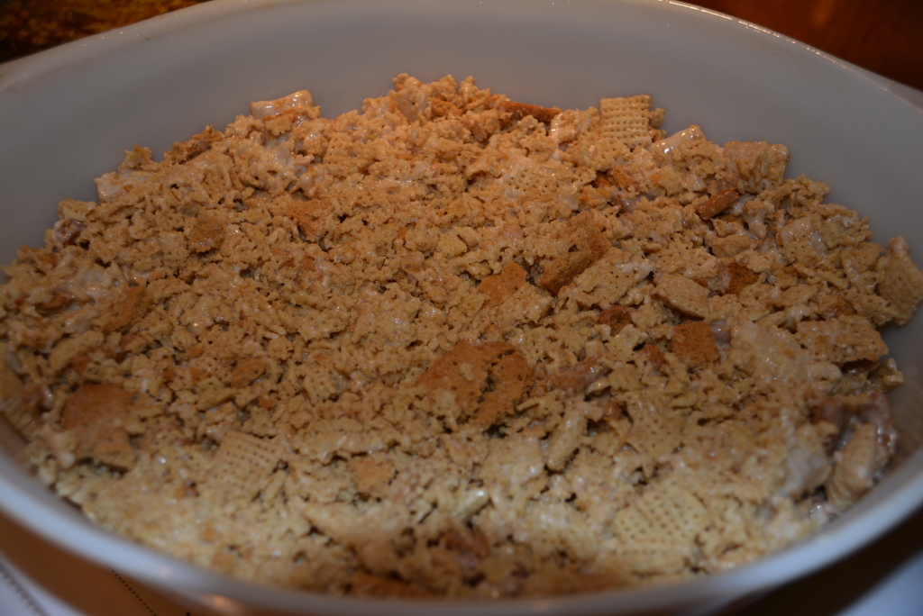 Press marshmallow cereal/cookie mixture into baking dish.