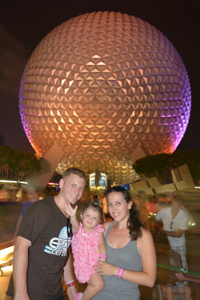 Hot and steamy nighttime  family picture in front of Epcot.