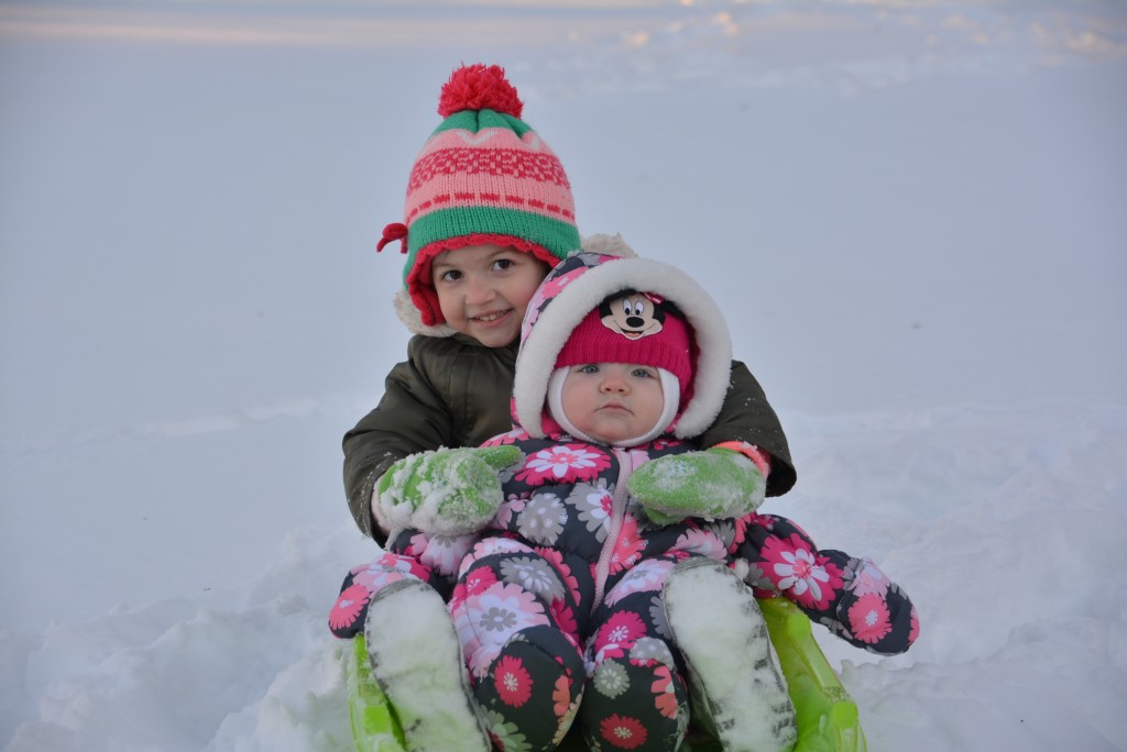 Two half breastfed/ formula bed girls loving the Northeast Blizzard of 2016. Well, one more than the other!